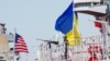 Фрегат ВМС Збройних сил України «Гетьман Сагайдачний та есмінець ВМС США «Дональд Кук» під час минулорічних військових навчань «Сі Бриз-2015». Вересень 2015 року